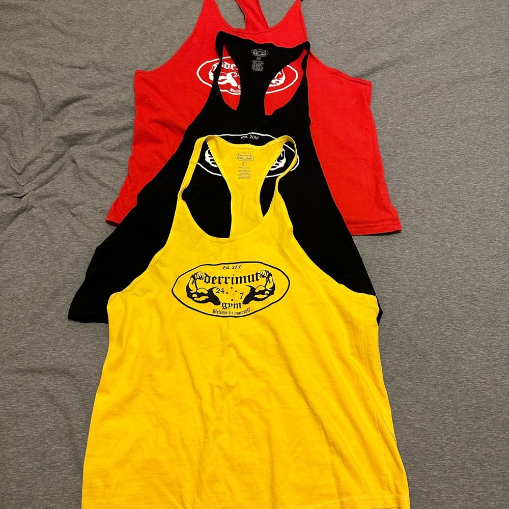 Derrimut Gym stringer tank top size XL. Yellow, red, and black. Like new.